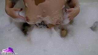 Cute Babe Sloppy Sucking Huge Dildo Sitting In Bath With Foam