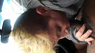 She's about to swallow a massive black nut deep throat