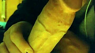 The stepsister is sucking her stepfather's cock, leading to a cumshot.