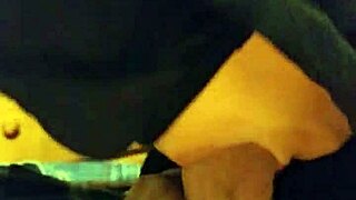 The stepsister is sucking her stepfather's cock, leading to a cumshot.