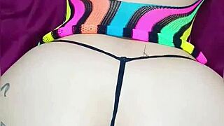 Beautiful Tattooed Woman Bent Over in Thong Swallowing Huge Cock