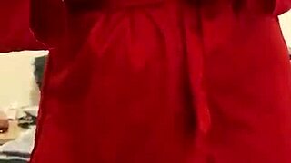 brunette in red lingerie relaxes alone