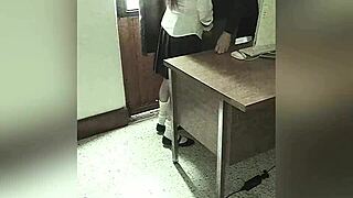 Camera Records Teacher And Student In School Office