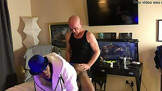 Ebony daddy plugs twink's ass in gay encounter.