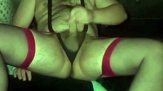 gay man in red stockings rubs his little dick and shows huge ass