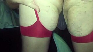 gay man in red stockings rubs his little dick and shows huge ass