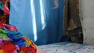 sissy crossdresser in pink shirt teases with mini skirt