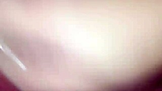 claudia enjoys her quiet time with a fresh cucumber in the garden