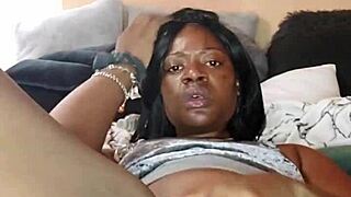 Ebony babe teases with striptease before squirting