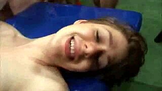 Two young nymphos get banged by a group of men in a gangbang