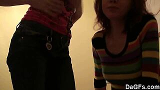 Two teens play with camera in bedroom