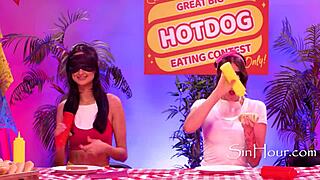 Dkye Wets Strapon in Lesbian Threesome at Hotdog Contest