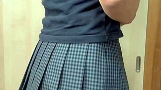 Blue-haired maid in sexy lingerie enjoys playful accessory fun with style.