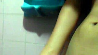 Young guy jerks off solo, stroking his cock from base to tip repeatedly until cumming