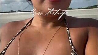 married woman showing off at beach with bikini