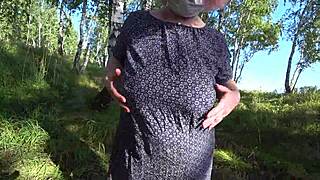 In the forest, girlfriend fucks MILF doggystyle with dildo, shaking big ass in panties