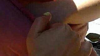 she's rubbing her huge tits in public, flashing everyone around her with big tits