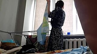 Girlfriend's pussy fucked hard in doggystyle while hanging laundry