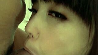 Horny Asian Yume Aoi Sucks Two Hard Cocks for Jism