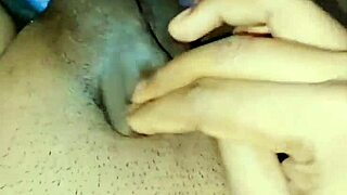 rubbing my limp clitty while pissing in thong striptease