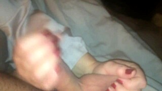 Wife gives intense handjob to monster cock in private clip