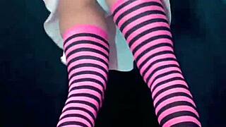 Bonneyuwu drinks from a bottle in a skirt