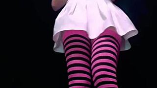 Bonneyuwu drinks from a bottle in a skirt