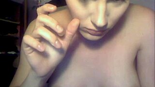 Stunning shemale with short hair performs on webcam, showcasing her transsexual allure and ladyboy charm