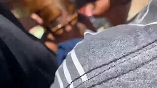 Teasing couple gets facial on beach with big cock