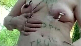 housewife slave bent over in forest for maledom session