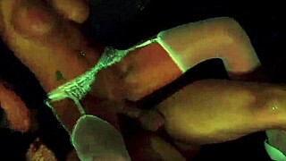 Blonde women in hospital uniforms engage in teasing activities