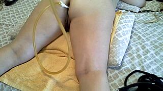 Slave Endures Two White Wine Enemas and Spankings in BDSM Session