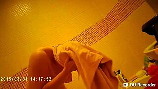Spy cam catches nude tits in steamy shower action!