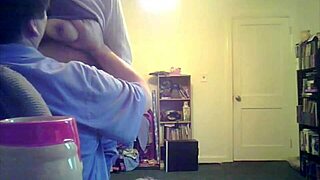 brunette milf loris shows off her tits in the living room