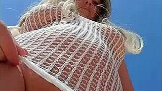 Blonde wears transparent dress without underwear in public