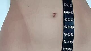 Punishing myself lightly with a belt, exposing tits and pussy