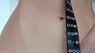 Punishing myself lightly with a belt, exposing tits and pussy