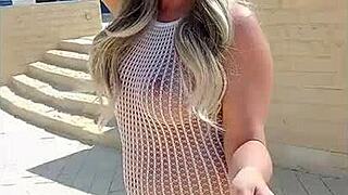 Blonde wears transparent dress without underwear in public