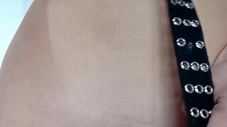 Punishing myself lightly with a belt, exposing tits and pussy