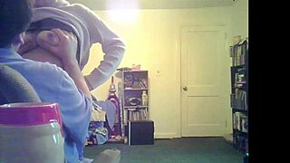 brunette milf loris shows off her tits in the living room