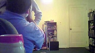 brunette milf loris shows off her tits in the living room