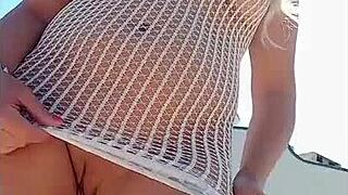 Blonde wears transparent dress without underwear in public