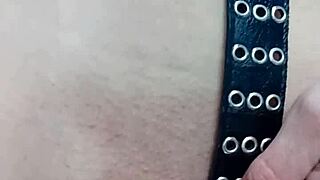 Punishing myself lightly with a belt, exposing tits and pussy