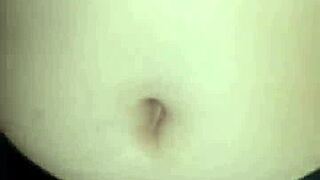 I peck her belly button while she rides me to orgasm