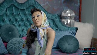 Asa Akira, the big-boobed Asian milf, performs a seductive solo striptease in softcore video.