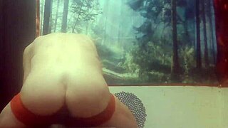 Tranny showing ass with dildo