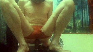 Tranny showing ass with dildo