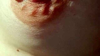 Amateurs explore braless nipples in a casual, intimate setting.