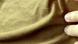 Amateurs explore braless nipples in a casual, intimate setting.