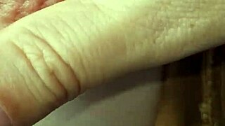 Amateurs explore braless nipples in a casual, intimate setting.